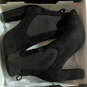 Black booties size 5.5. Fits closer to a size 6